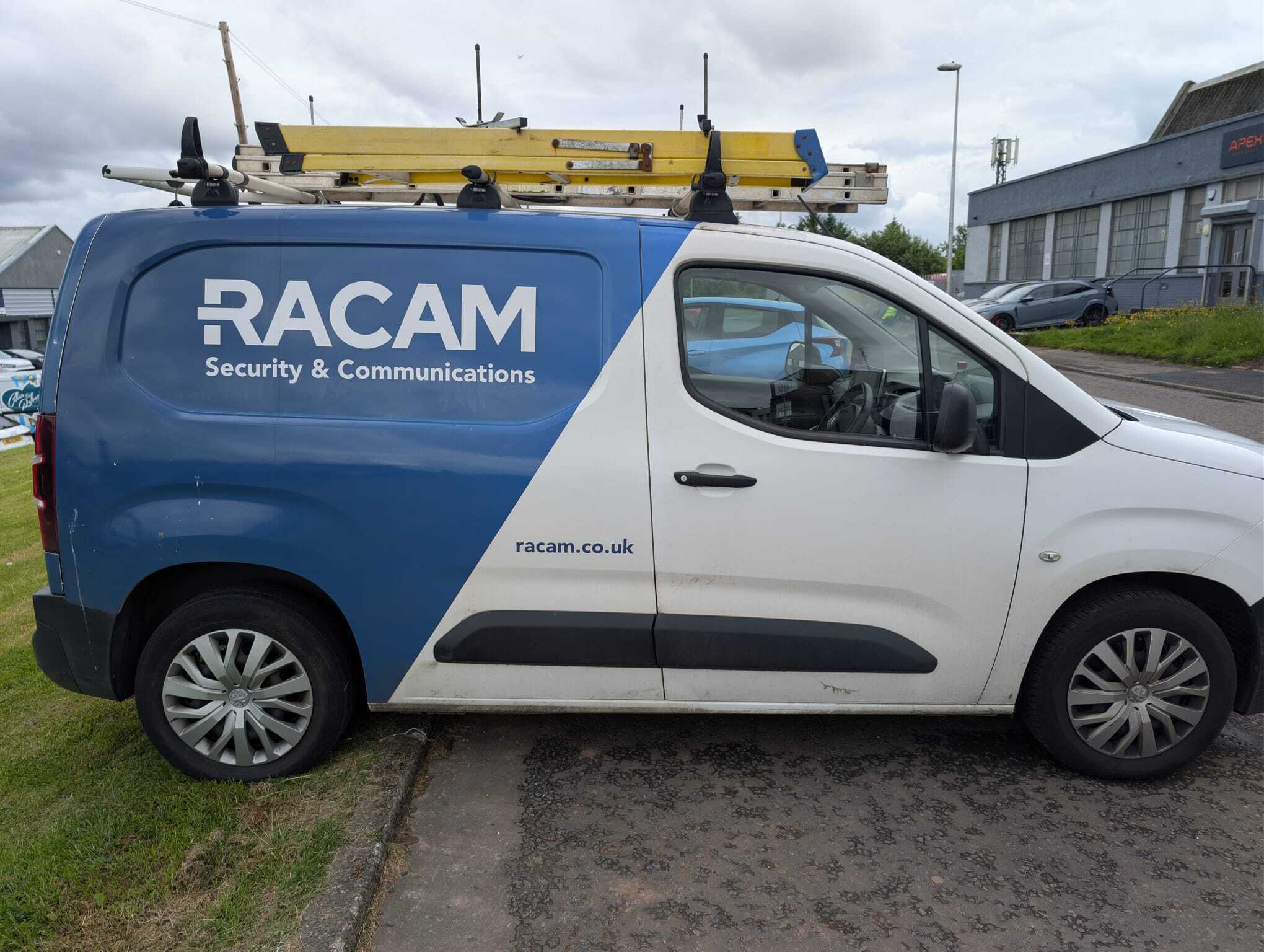 RACAM Security & Communications branded van